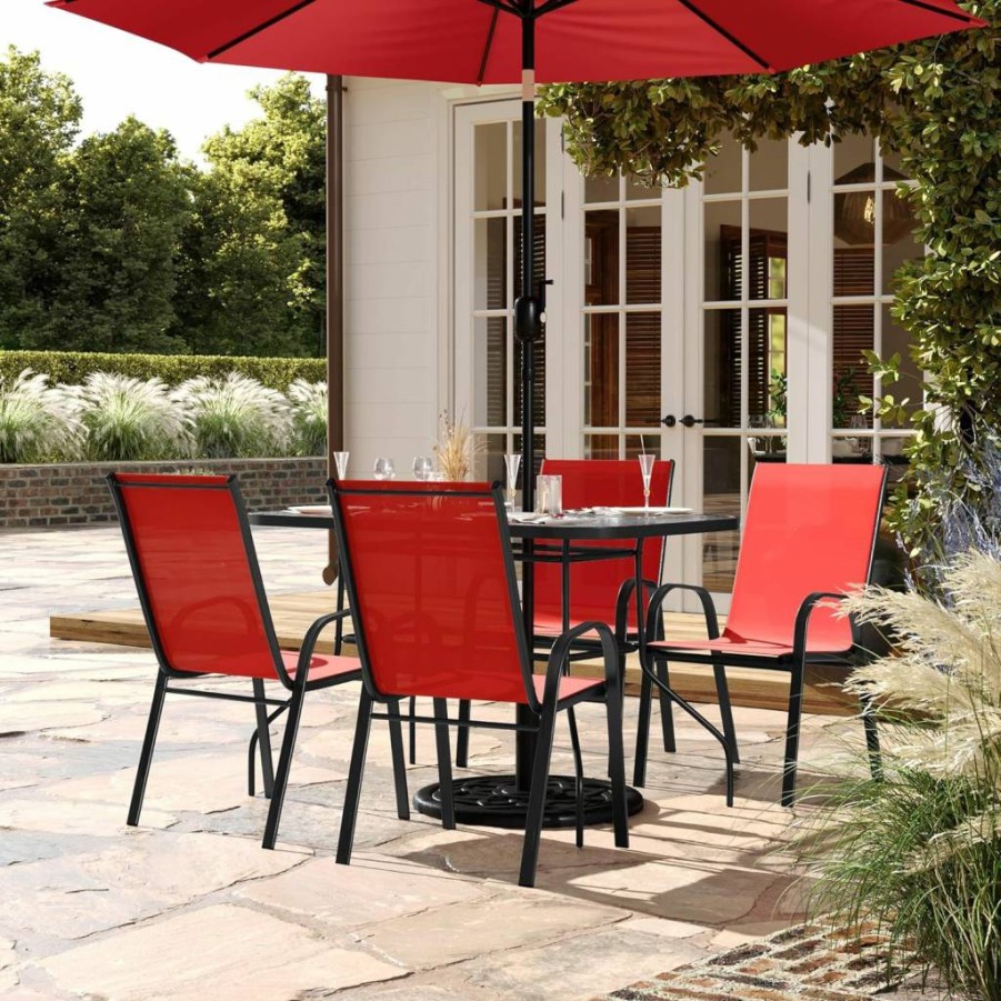 Flash Furniture Brazos 47" Outdoor Dining Set with Tempered Glass Table, 4 Stackable Flex Comfort Chairs, Navy/Black, Umbrella Hole - Commercial Patio Furniture