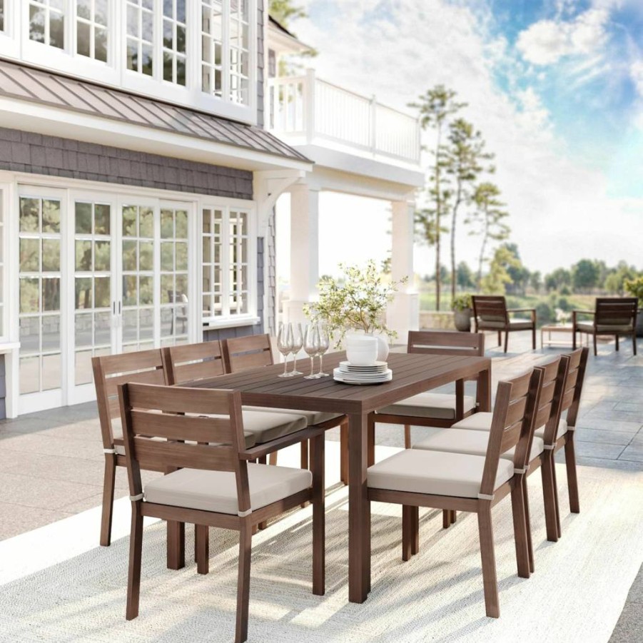 Martha Stewart Bedford 9-Piece Outdoor Patio Dining Set with 71-Inch Aluminum Table and 8 Stackable Chairs, Gray Woodgrain Finish & All-Weather Cushions